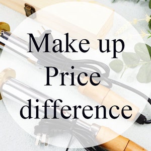 May include: Two electric wax sealers with wooden handles and black cords. The text "Make up Price difference" is written on a white background.
