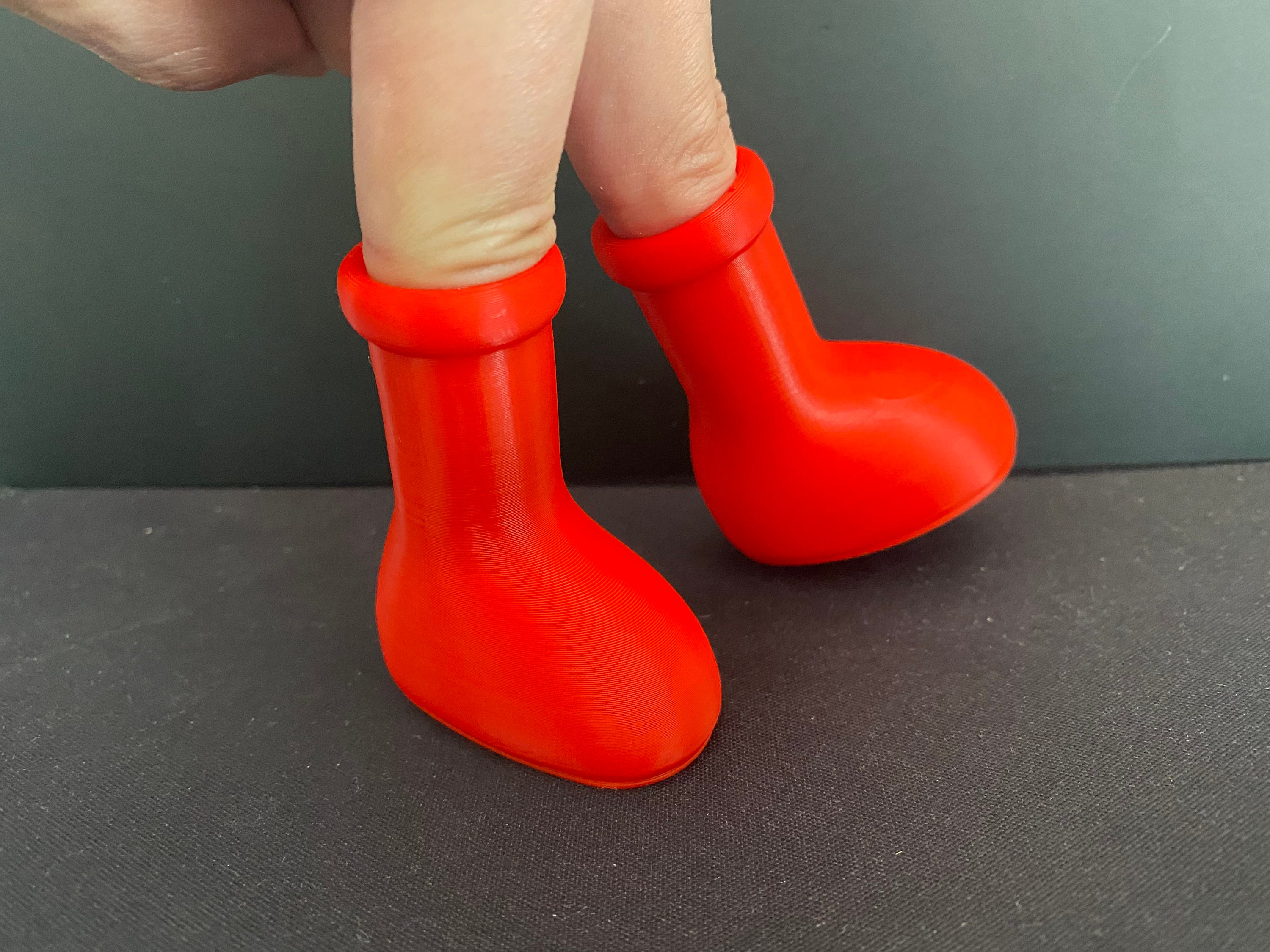 These Big Red Objects From MSCHF Claim to Be Boots - The New York