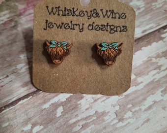 Highland cow wood studs on stainless steel posts