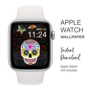 May include: A white Apple Watch with a colorful Day of the Dead skull wallpaper. The watch face displays the time and a butterfly graphic. Text on the right side reads "APPLE WATCH WALLPAPER" and "Instant Download."
