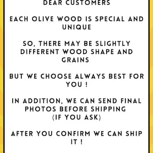 May include: A white rectangular sign with black text on a yellow background. The text reads "DEAR CUSTOMERS" and details about olive wood products, including shape and grain variations. The sign also mentions sending photos before shipping.