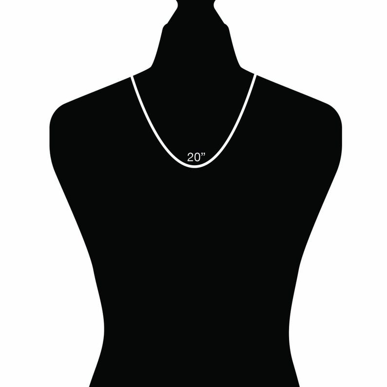 May include: A white necklace on a black mannequin. The necklace is 20 inches long.