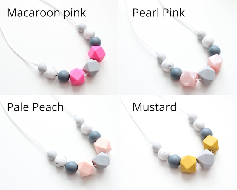 May include: Four silicone teething necklaces with different colored beads. The necklaces are made with gray, white, and a variety of colored beads. The colors are macaroon pink, pearl pink, pale peach, and mustard.