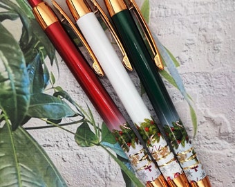 Stylo à bille de Noël dans un étui en velours - en rouge, blanc et vert. Aux motifs festifs, personnalisables.