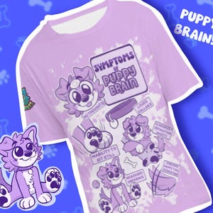 以下が含まれることがあります： 漫画の子犬のグラフィックと「SYMPTOMS OF PUPPY BRAIN」のテキストが入った薄紫色のTシャツ。このシャツには、「NO THOUGHTS」や「INABILITY TO SIT STILL」など、子犬の行動のイラストも表示されています。