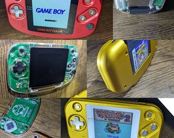 Frog Boy Color custom build. Pick your own color. AMOLED touch screen. Aluminum or clear resin. Gba form factor, big color games. Nintendo