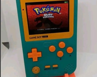 Gameboy Pocket with raspberry Lcd backlit screen & custom shell. Has retro emulators ran from a compute module 3 ras pi. kite circuit sheild