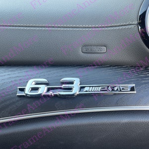1 x 3D raised 6.3AMG Metal Made Dashboard, Center Console Emblem Badge Interior Exterior Logo For C63 E63 CLS63 CLK63 ML63 GLE63 SL63 G63