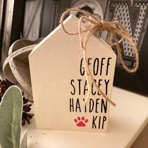 White wooden personalized house for tier tray decor.