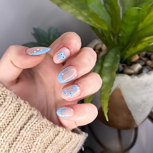 Blue And White Heart Faces French Tip Press On Nails cute baby blue stick on nail kit with glue, heart nails, blue french tips nails image 1