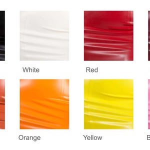 Puede incluir: Una carta de colores que muestra diferentes tonos de cuero. Los colores incluyen negro, blanco, rojo, ciruela, naranja quemado, naranja, amarillo y rosa chicle.