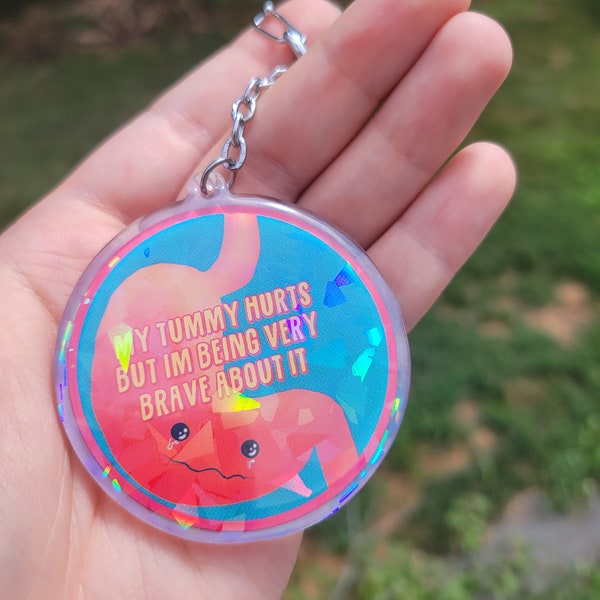 My Tummy Hurts but Im Being Very Brave About it Holographic Keychain (Version 2)