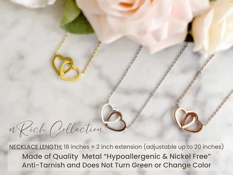 May include: Three necklaces with interlocking heart pendants. The necklaces are gold, silver, and rose gold. The text "n Rich Collection" is at the bottom. The necklace length is 18 inches with a 2-inch extension.