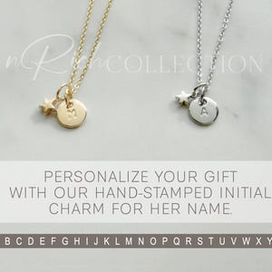May include: Two necklaces with a star charm and a personalised initial disc. The necklaces are available in gold and silver. The initial discs are available in all letters of the alphabet.  PERSONALIZE YOUR GIFT WITH OUR HAND-STAMPED INITIAL CHARM FOR HER NAME. ABCDEFGHIJKLMNOPQRSTUVWXYZ