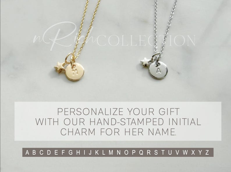 May include: Two necklaces with a star charm and a personalised initial disc. The necklaces are available in gold and silver. The initial discs are available in all letters of the alphabet.  PERSONALIZE YOUR GIFT WITH OUR HAND-STAMPED INITIAL CHARM FOR HER NAME. ABCDEFGHIJKLMNOPQRSTUVWXYZ