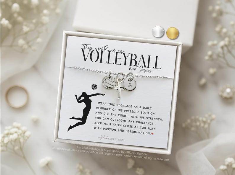 May include: A silver necklace with a volleyball charm, a cross charm, and a letter charm. The necklace comes in a white box with a black and white image of a volleyball player and the text "This girl runs on volleyball and Jesus".