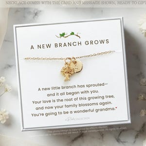 May include: A gold-colored necklace with a tree charm and a round charm, presented on a white card. The card reads "A New Branch Grows" with a message about family. The necklace is ready to gift.
