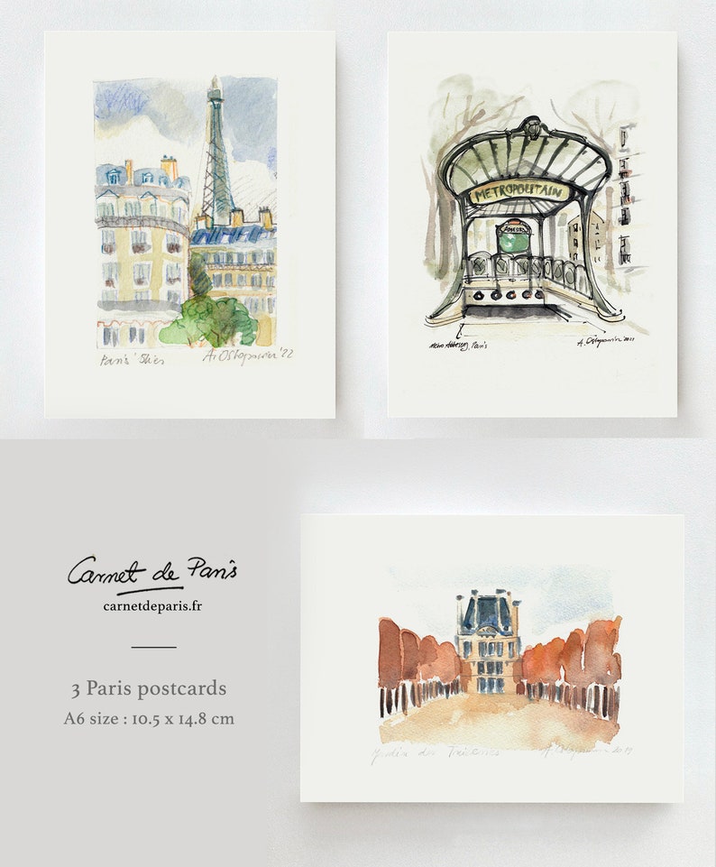May include: Set of three watercolor postcards featuring Parisian landmarks. The postcards depict the Eiffel Tower, a Parisian metro entrance, and a view of the Jardin du Palais Royal. The postcards are printed on high-quality paper and measure 10.5 x 14.8 cm.