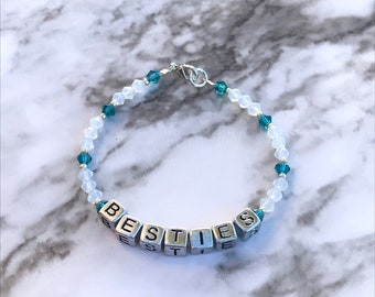 Sentimental Jewelry! These bracelets are made with glass beads and square beaded initials. These bracelets look great stacked.