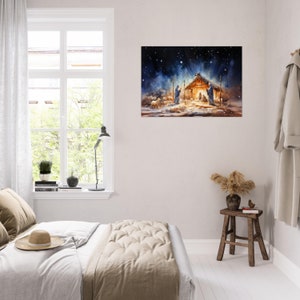 May include: A watercolor painting of a nativity scene with a wooden stable, two figures, and sheep in the foreground. The background is a dark blue sky with white stars.