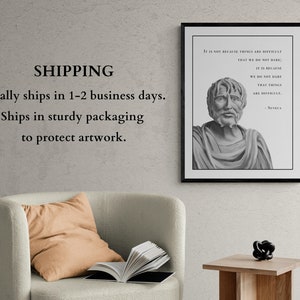 May include: A black and white framed print of a bust of a man with a quote by Seneca: "It is not because things are difficult that we do not dare; it is because we do not dare that things are difficult."