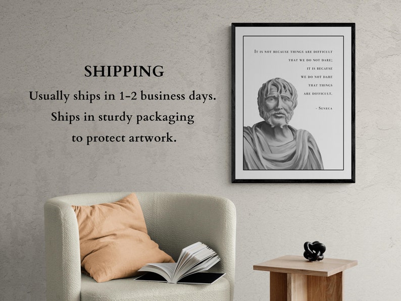 May include: A black and white framed print of a bust of a man with a quote by Seneca: "It is not because things are difficult that we do not dare; it is because we do not dare that things are difficult."