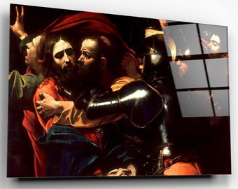 Op de afbeelding: Een schilderij dat een dramatische scène van de arrestatie van Jezus afbeeldt. Het schilderij is donker en stemmig, met sterke contrasten van licht en schaduw. Jezus wordt omringd door soldaten, waarvan er één hem bij de arm vasthoudt. De soldaten dragen harnassen en dragen wapens. Jezus draagt een rode mantel en heeft een droevige uitdrukking op zijn gezicht.