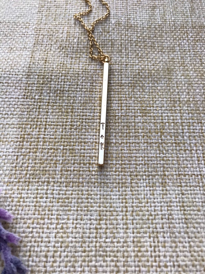custom hand stamped gold four sided vertical bar necklace