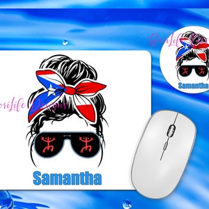 May include: A white mouse pad with a black and white illustration of a woman with a red, white, and blue headband and sunglasses. The sunglasses have a red symbol on each lens. The text "Samantha" is below the illustration.