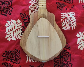 Tahitian Ukulele PU(Shell) Shaped 6 string.