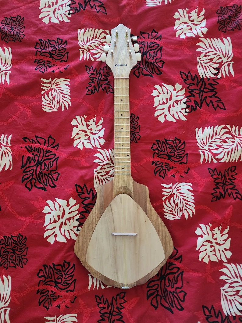 Tahitian Ukulele PUShell Shaped 6 string. image 1