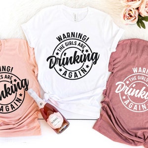 Warning The Girls Are Drinking Again Shirt, Funny Drinking Shirt, Wine Tshirt, Day Drinking Shirt, Alcohol Shirt, Bachelorette Party Shirts