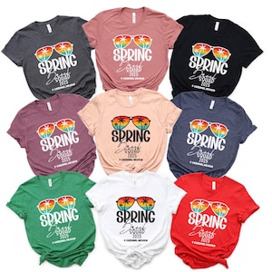 May include: Ten different coloured t-shirts with a graphic design of sunglasses and the text "Spring Break Squad 2025" printed on the front.
