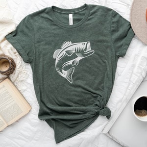 May include: A heather forest green t-shirt with a white graphic of a bass fish jumping out of the water.