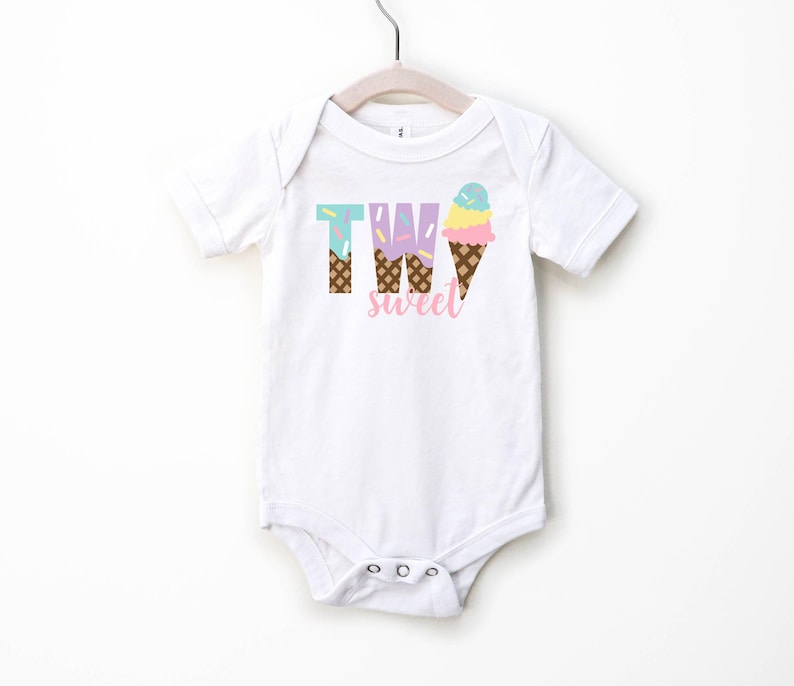 May include: White short-sleeved bodysuit with the text "TWO sweet" in pink letters. The "TWO" is made up of ice cream cones with sprinkles and a pink, yellow, and blue ice cream scoop.