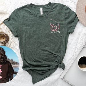May include: A green t-shirt with a pink stethoscope and heart graphic and the text "Nurse Amy".