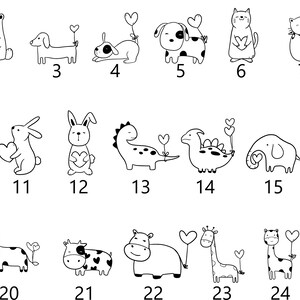 Peut inclure: Un ensemble de 26 illustrations en noir et blanc d'animaux tenant des c&oelig;urs. Les animaux comprennent un ours, un chien, un chat, un &eacute;cureuil, un lapin, un dinosaure, un &eacute;l&eacute;phant, un lion, une licorne, un cheval, une vache, un hippopotame, une girafe et un mouton.