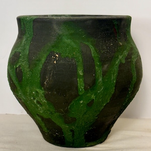 May include: A set of three ceramic mugs with a speckled, matte finish. The mugs are in shades of cream, light gray, and dark gray. Each mug has a simple, minimalist design, perfect for coffee or tea.