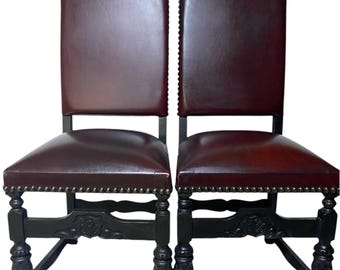 2 Handcarved Spanish Revival High-Backed Studded Burgundy faux Leather Chairs