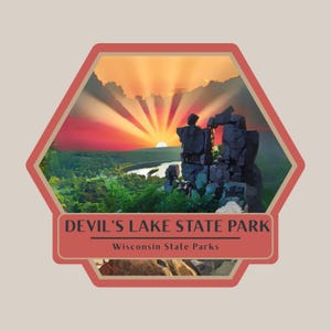 May include: A hexagonal sticker featuring a scenic view of Devil's Lake State Park in Wisconsin. The design includes a sunset, rock formations, and the text "Devil's Lake State Park" and "Wisconsin State Parks".