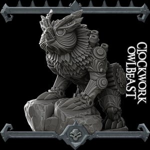 May include: A grey sculpture of a mechanical owl-like creature, perched on a rock base. The sculpture features intricate gears and mechanical elements, with the text "CLOCKWORK OWLBEAST" in white. The design is a blend of nature and technology, with fine detailing.