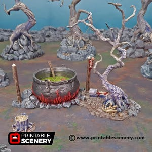 May include: A miniature fantasy scene featuring a cauldron with green liquid and a wooden stirring stick. The cauldron sits atop a bed of red flames. The scene includes stylized trees, rocks, and a wooden post with a hanging object.