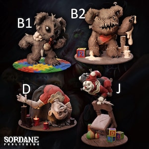 May include: A collection of four detailed figurines. One is a brown teddy bear with stitched seams and a menacing expression. Another is a clown in red and white. The other two are figures of a monster and a person bent over.