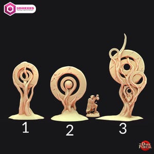 May include: A collection of beige 3D-printed tabletop scenery pieces. The set includes three stylized tree-like structures with circular elements and a miniature figure. The text "3DHEXES" and "The Dark Portal" are visible.