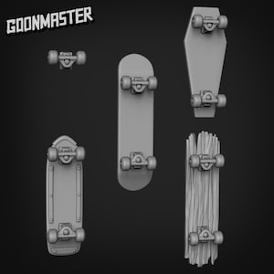 May include: A collection of gray skateboards in various shapes and sizes, including a classic deck, a coffin-shaped board, and a wooden textured design. The image features the text "GOONMASTER" in the upper left corner.