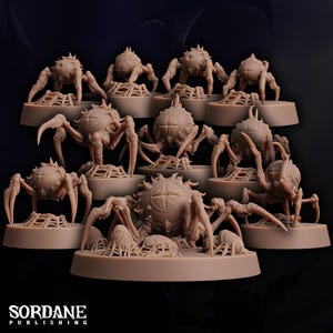May include: A collection of beige-colored, detailed miniature spider creatures, each with multiple legs and a spiky exterior. They are arranged on circular bases, with some featuring web-like structures. The "Sordane Publishing" logo is visible at the bottom.