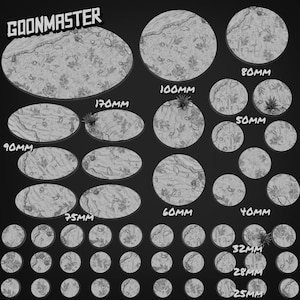 May include: A collection of grey miniature bases labelled GOONMASTER, featuring textured surfaces with sculpted foliage, rocks, and debris. The set includes various circular and oval sizes ranging from 25mm to 170mm, clearly marked with their respective metric dimensions.