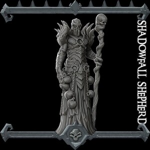 May include: A gray, detailed statue of a robed figure holding a staff topped with a skull. The figure has a skull-like mask and is adorned with chains and skulls. The text "SHADOWFALL SHEPHERD" is on the right side of the image.