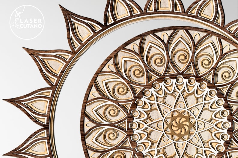 May include: A detailed wooden mandala with intricate patterns and layers, cut in a circular shape. The mandala is made of light and dark wood, creating a beautiful contrast.
