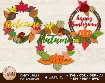 May include: Three layered autumn wreaths with fall leaves, pumpkins, and acorns. The wreaths say "welcome", "autumn", and "happy thanksgiving".